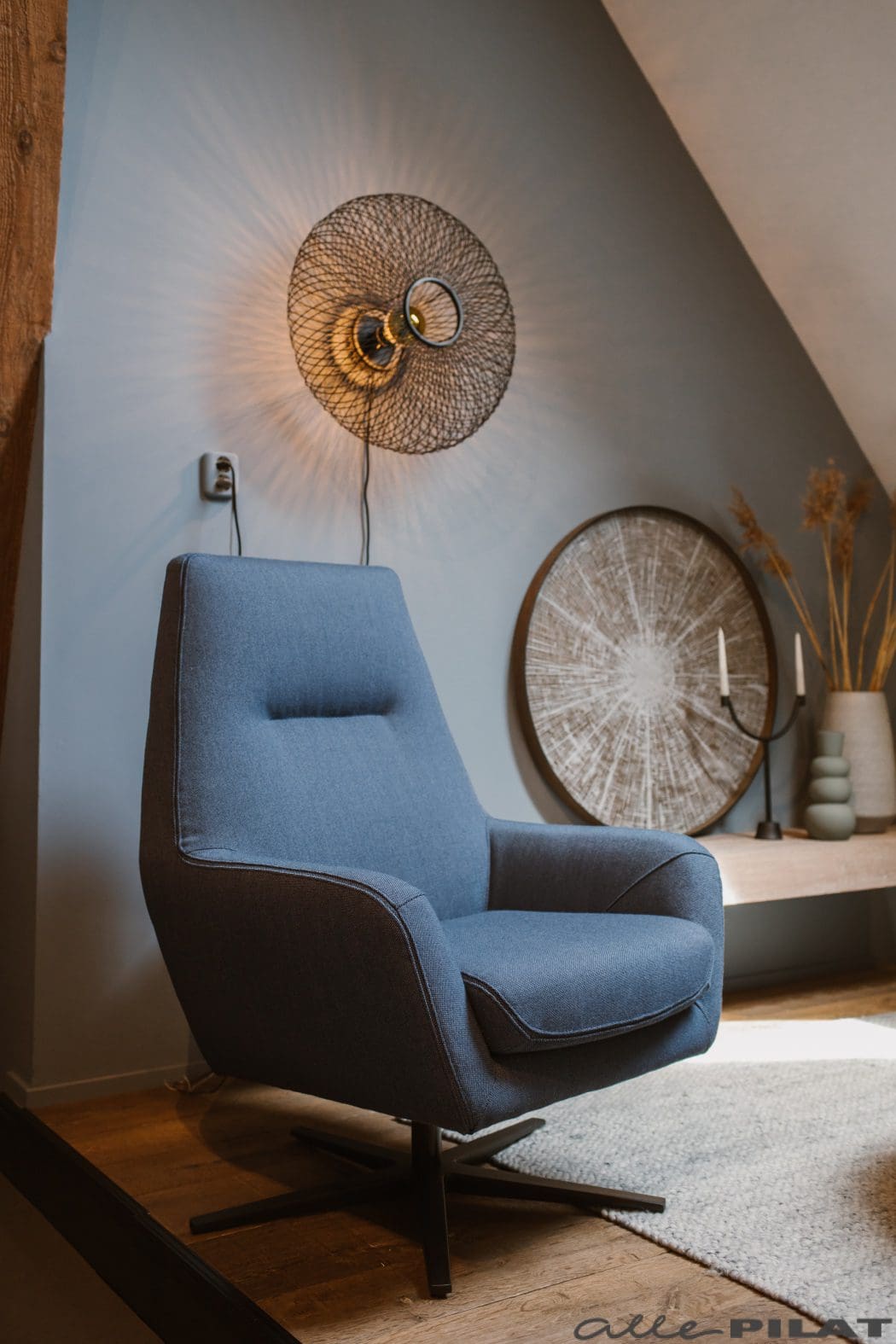 Draaifauteuil Bruce in blauwe stof 